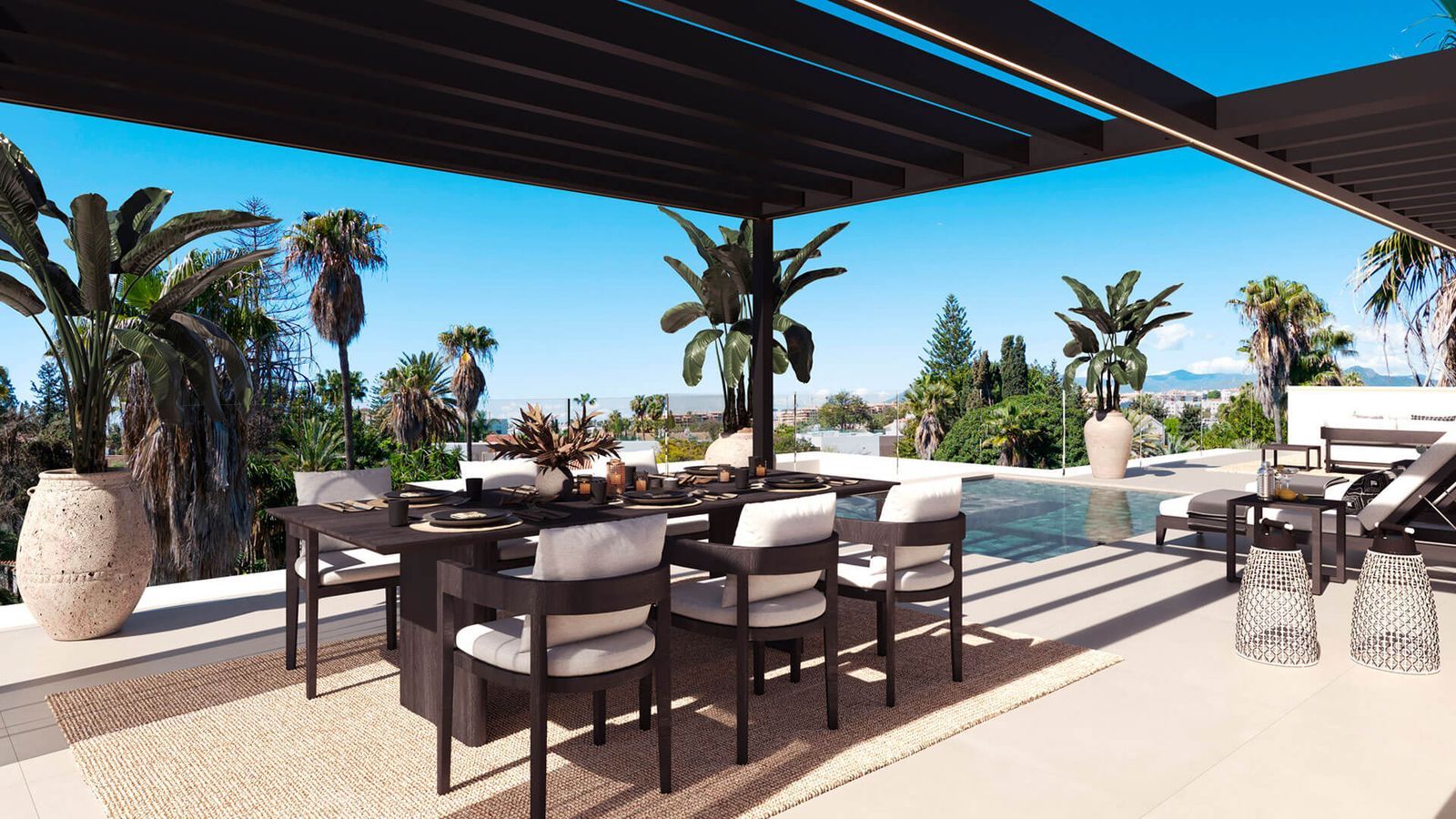 Luxueuse terrasse à manger extérieure avec piscine et plantes tropicales